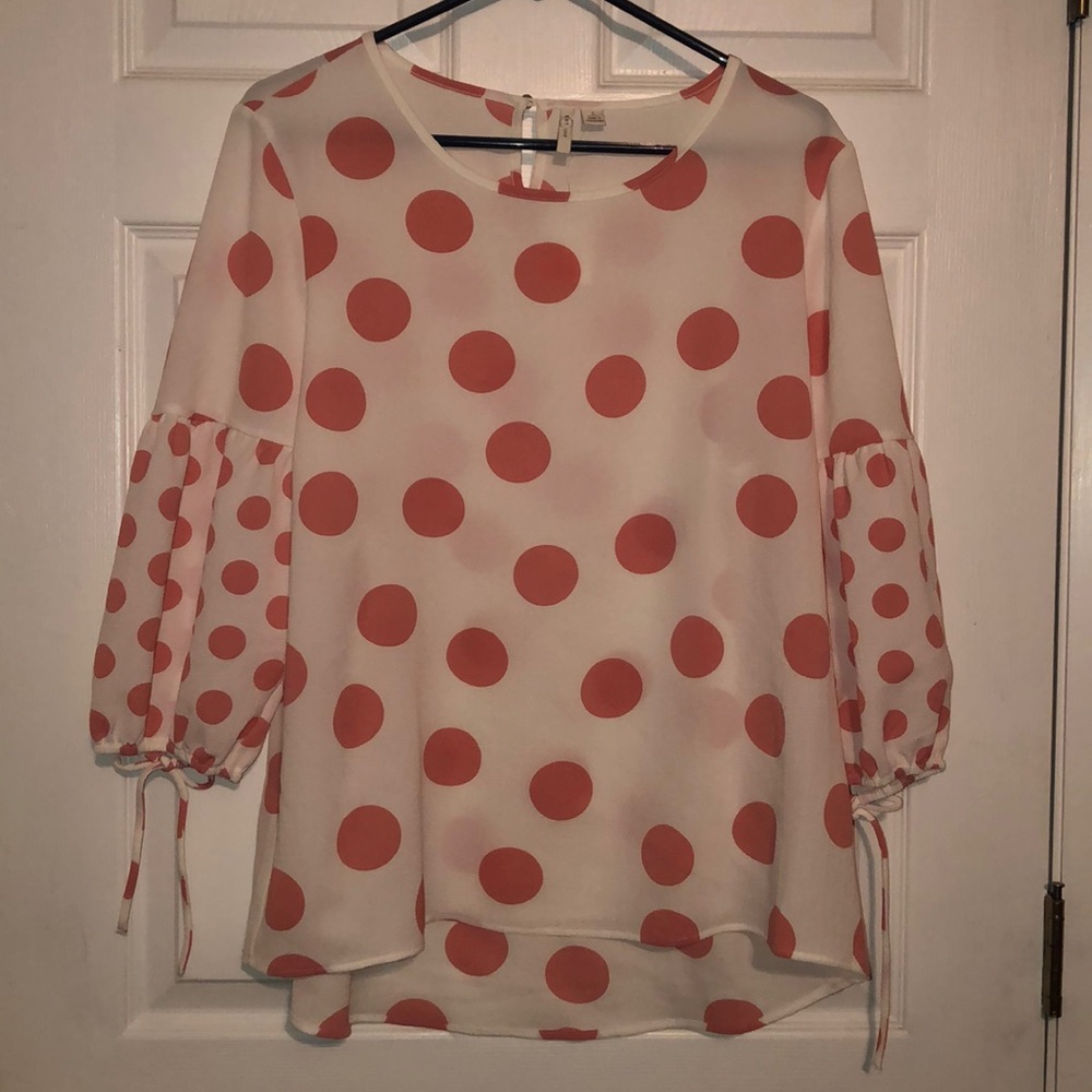 Pink polka dot blouse